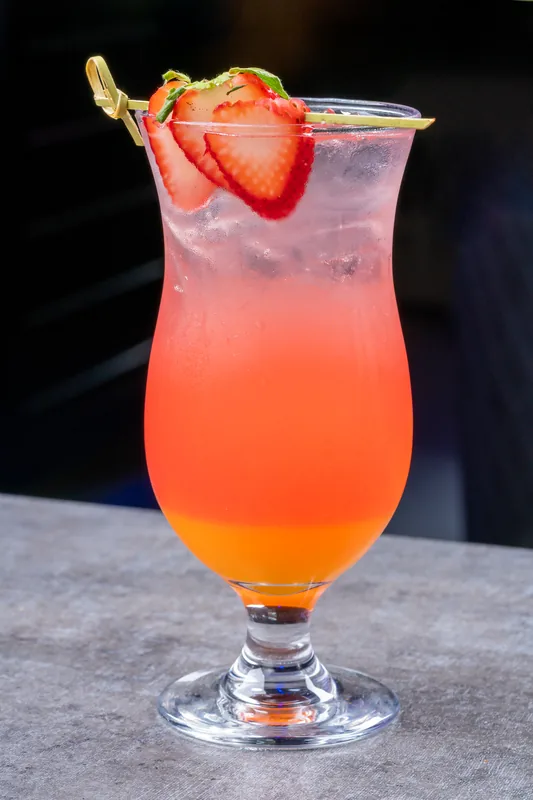 Strawberry cocktail in a hurricane glass at KamiKoi