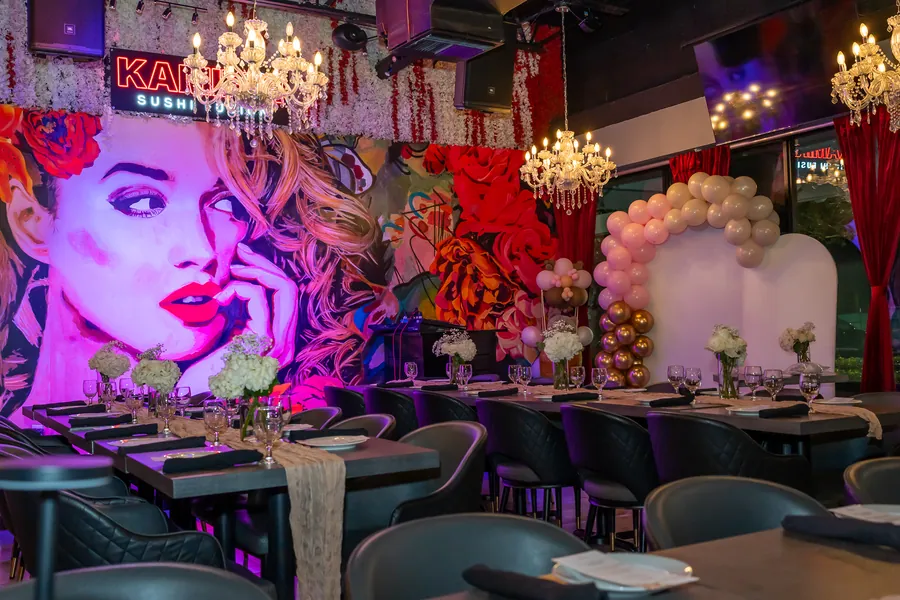 Balloon arch and set tables for a shower at KamiKoi