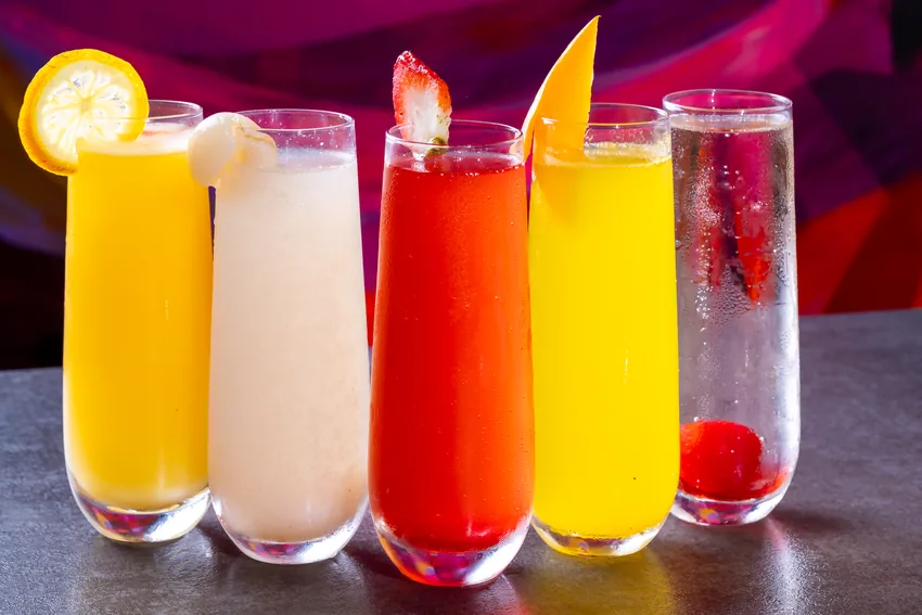 Mimosas and fresh juices lined up at the KamiKoi bar