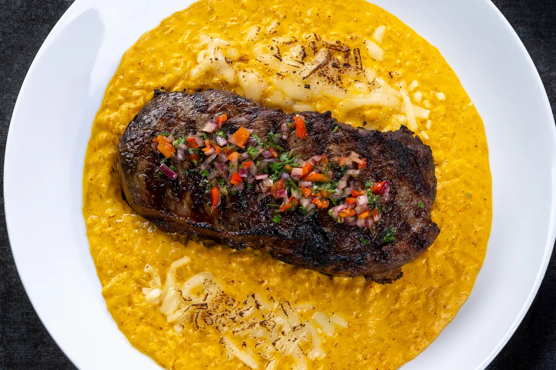 Grilled ribeye over creamy huancaina at KamiKoi Sushi Fusion in Miami